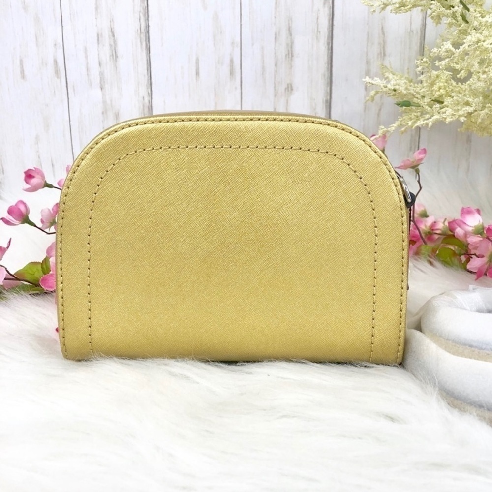 Marc Jacobs gold crossover purse with strap​​​​​​​​